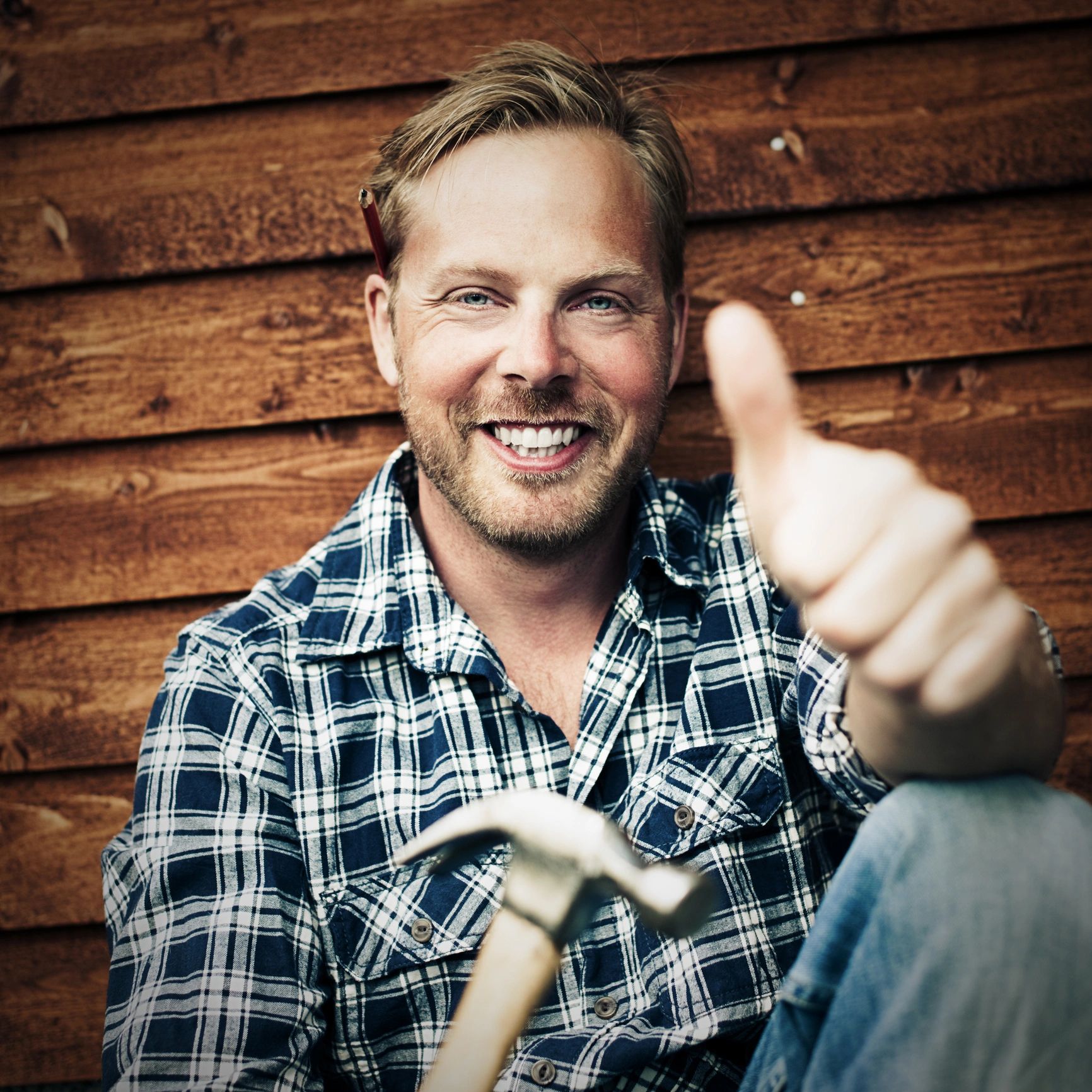 Professional tradesperson portrait representing a satisfied customer testimonial