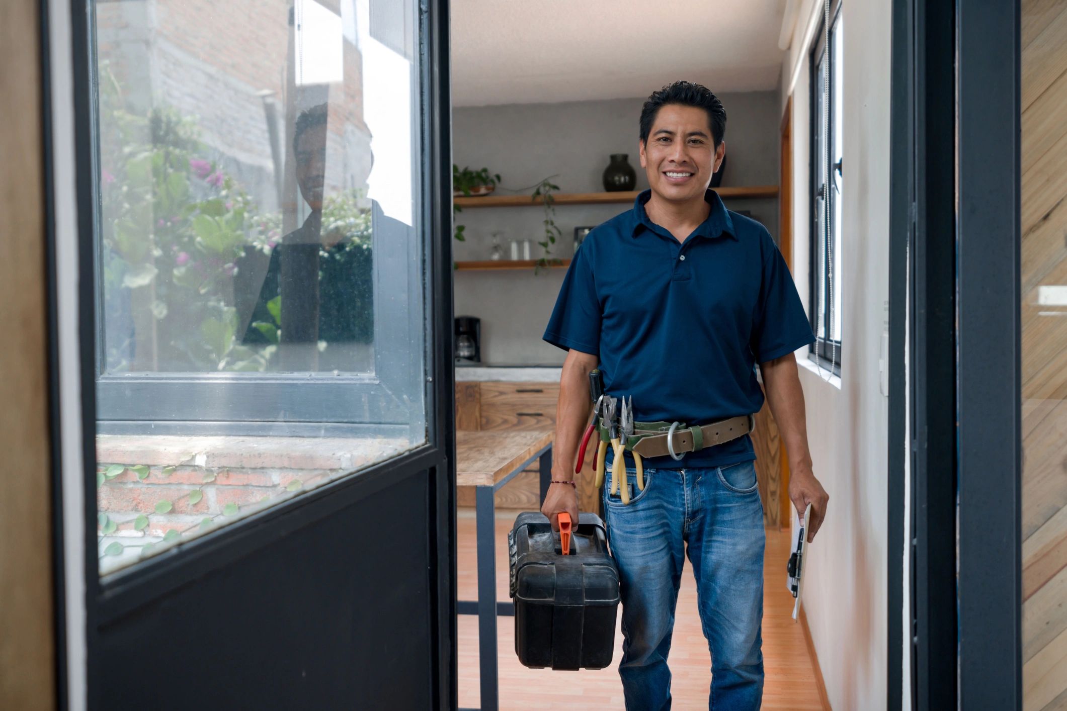 Handyman arriving with toolbox